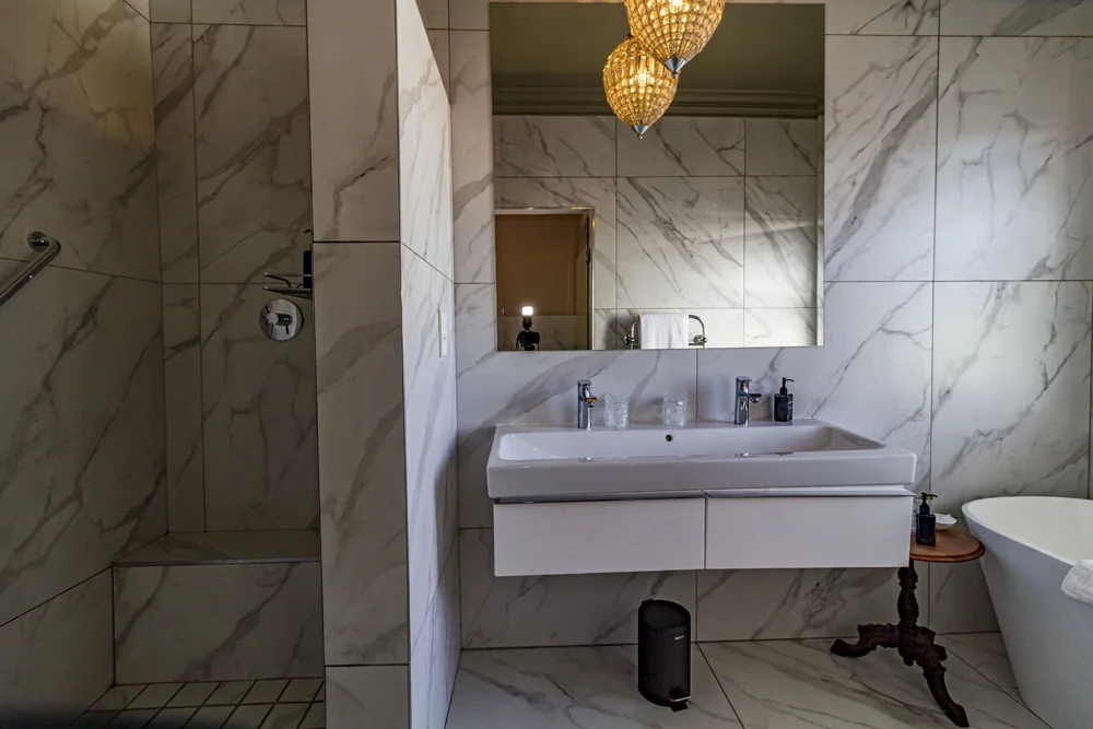 _MG_9987 Marble-look bathroom with a walk-in shower and basin