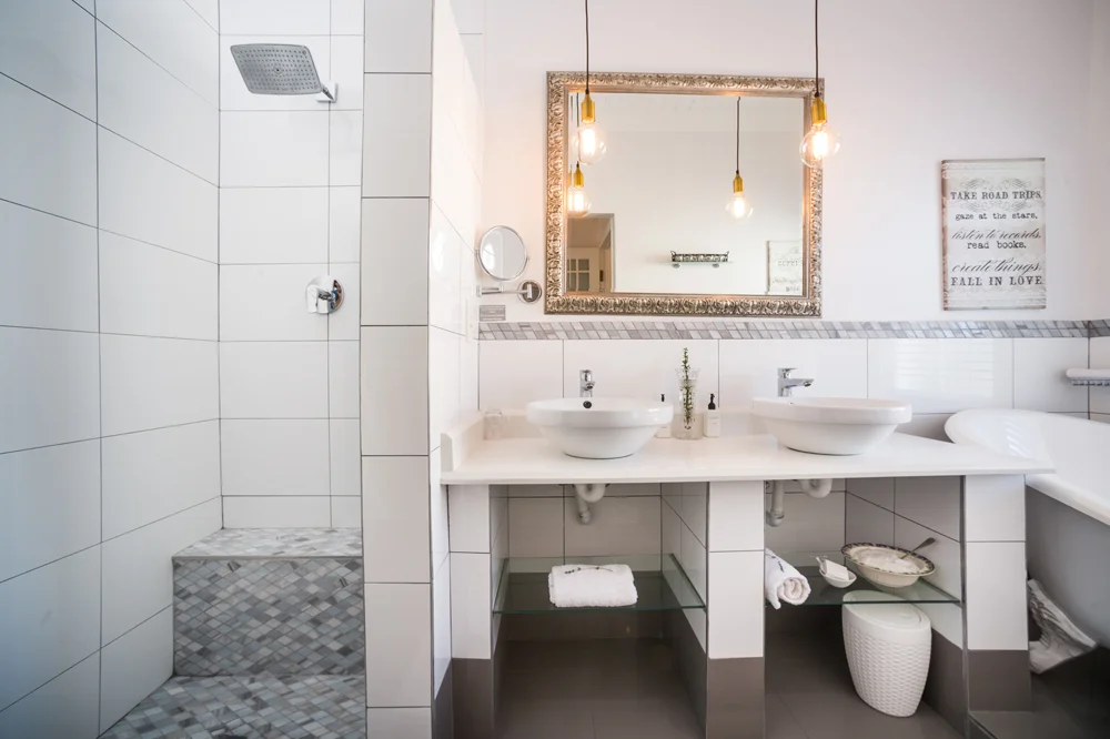 peartree_batavia-62 Double vessel basins in a white-tiled bathroom